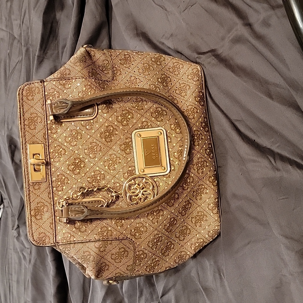 Brown and tan Guess hand bag